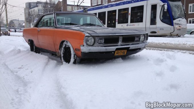 1973 Dodge Dart in the deep winter snow